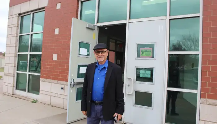 Yemeni American activist Ali Baleed Almaklani outside a polling station in Dearborn, Michigan, November 5 [Ali HarbAl Jazeera]