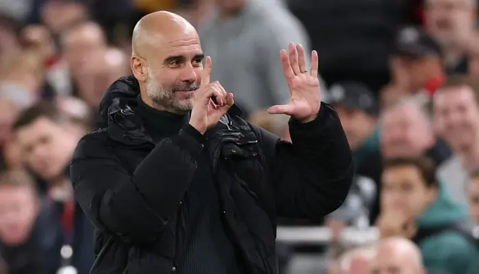 Pep Guardiola Reacts to Anfield Chants Amid Man City Struggles