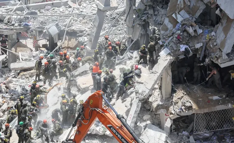 Israel-Iran Conflict Escalates With Missile Strikes, Civilian Deaths
