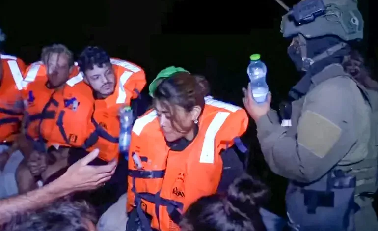 A Gaza aid boat carrying 12 activists and humanitarian supplies was intercepted by Israeli forces and redirected to Ashdod port on Monday. Interception in International Waters Organizers of the mission claimed that Madleen was stopped overnight while navigating through international waters. Despite being far from Israeli territory, the boat was seized and brought under military control. The interception sparked concern among human rights groups and pro-Palestinian activists who supported the mission. Arrival at Ashdod Port According to an AFP photographer on the scene, the boat reached Ashdod at approximately 8:45 pm local time. The Israeli military has not yet issued a detailed statement about the incident, but officials confirmed that the boat was redirected for security inspections. Read: Palestinian Rights Group Demands Release of Madleen Crew Mission Carried Humanitarian Supplies The Madleen was carrying essential supplies intended for residents of Gaza, who have long faced restrictions under an Israeli blockade. Organizers emphasized that the mission aimed to deliver food, medical aid, and other non-lethal materials to civilians suffering under dire humanitarian conditions. The boat also carried 12 international activists who support the Palestinian cause. Ongoing Tensions Over Gaza Blockade This interception highlights ongoing tensions surrounding the Israeli blockade on Gaza, which has drawn global criticism for restricting the movement of goods and people. Aid flotillas attempting to reach Gaza often face maritime blockades, with several similar missions in the past ending in confrontation. Activists continue to challenge the blockade, arguing it violates international law and human rights. Israel, however, maintains the restrictions are necessary to prevent weapons from reaching Hamas and other militant groups in Gaza. Follow us on Google News, Instagram, YouTube, Facebook,Whats App, and TikTok for latest updates