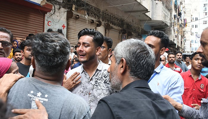 Karachi Building Collapse 27 Dead as Search for Victims Continues in Lyari
